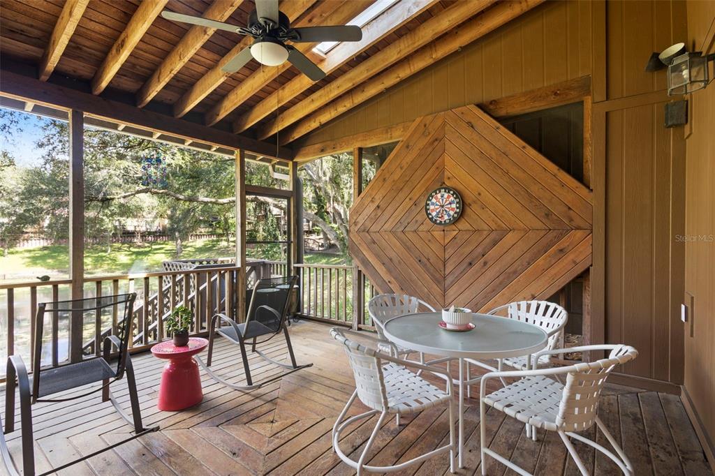 920 Shady Branch Trail DeLand, FL 32724 - Photo 41 of 46 a view of a chairs and table in the patio
