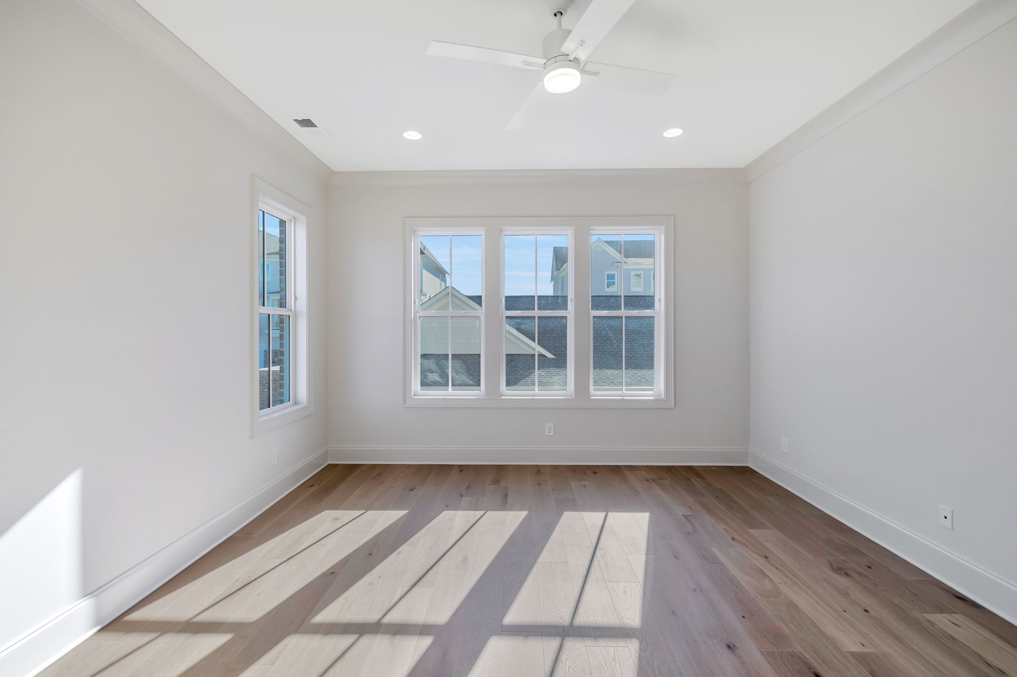 6037 Whitman Road, Unit 202 Franklin, TN 37064 - Photo 28 of 51 wooden floor in an empty room with a window