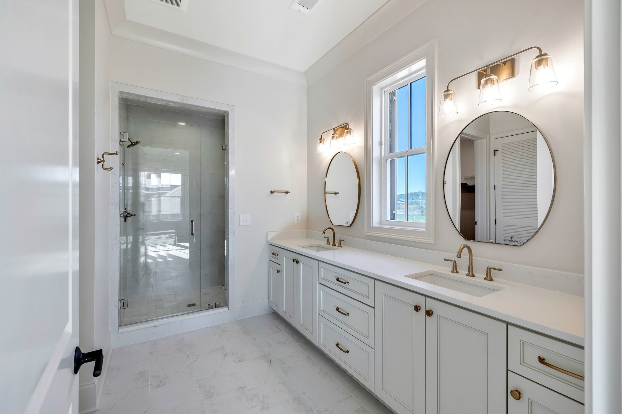 6037 Whitman Road, Unit 202 Franklin, TN 37064 - Photo 30 of 51 a bathroom with a double vanity sink and a mirror