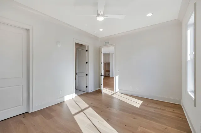 a bathroom with a sink vanity and toilet