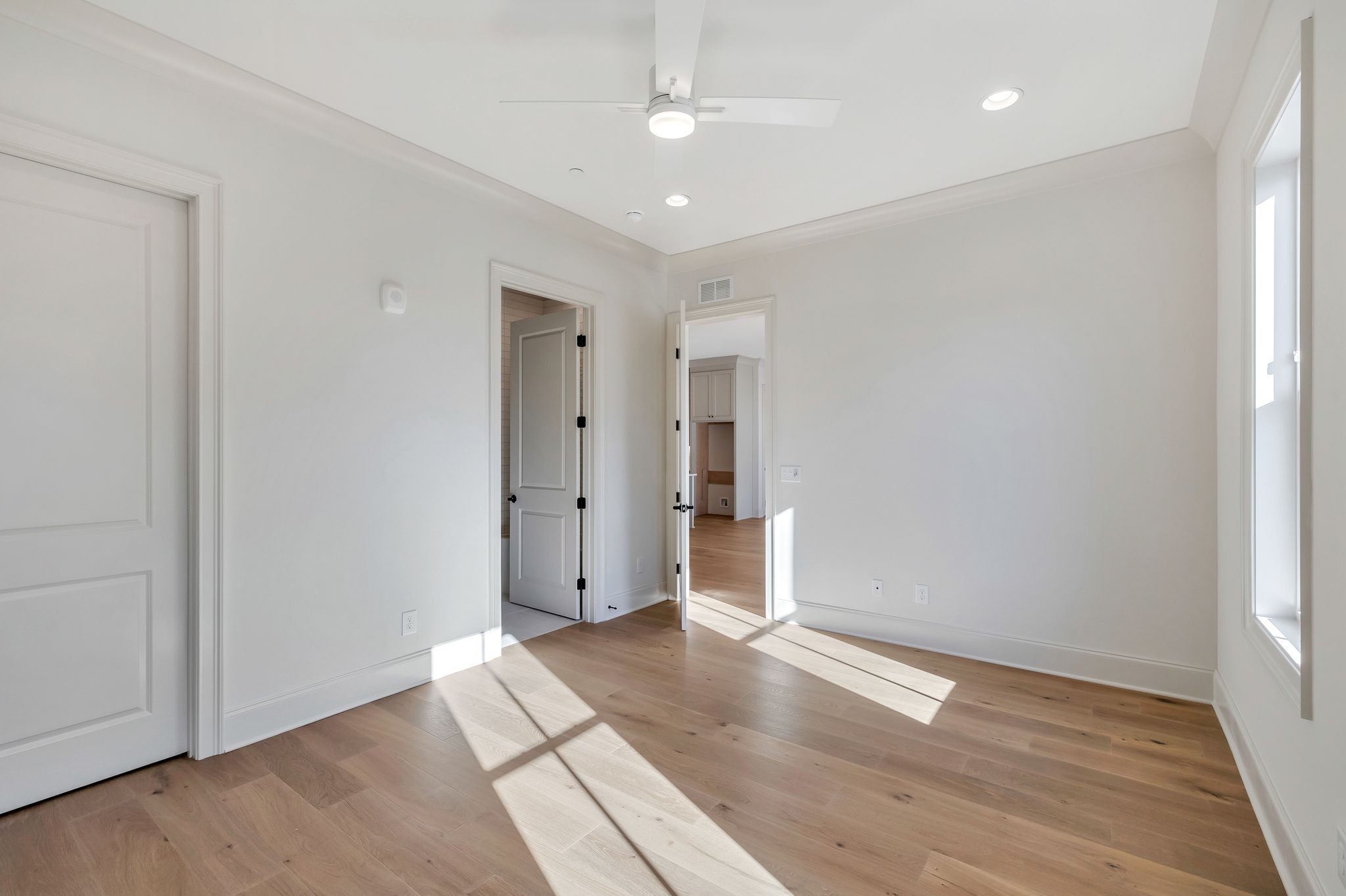 6037 Whitman Road, Unit 202 Franklin, TN 37064 - Photo 36 of 51 wooden floor in an empty room with a window