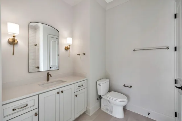 a bathroom with a sink and mirror