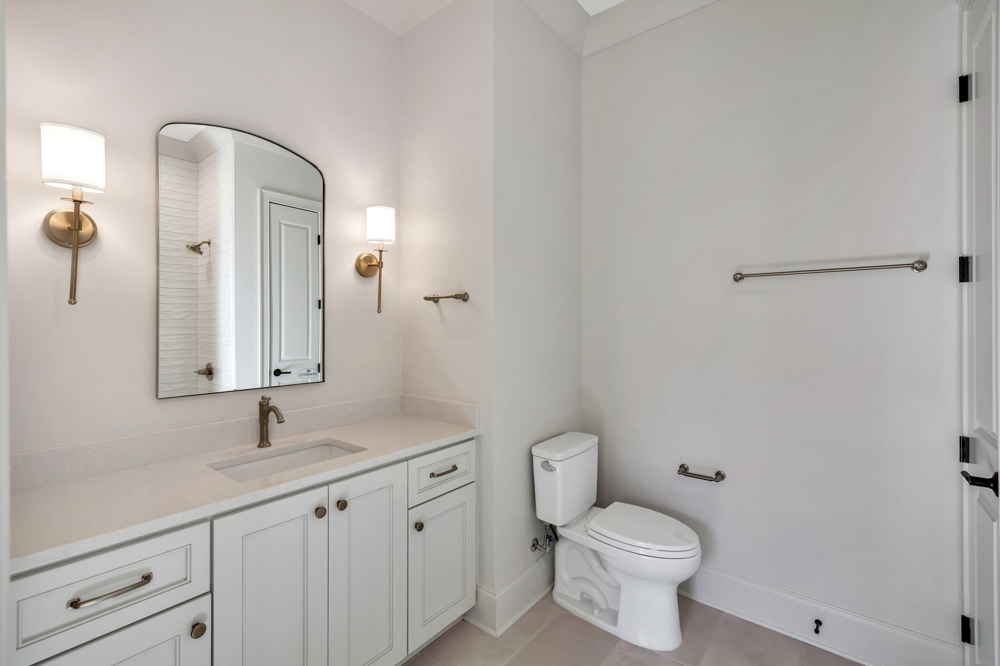 6037 Whitman Road, Unit 202 Franklin, TN 37064 - Photo 37 of 51 a bathroom with a toilet sink and mirror