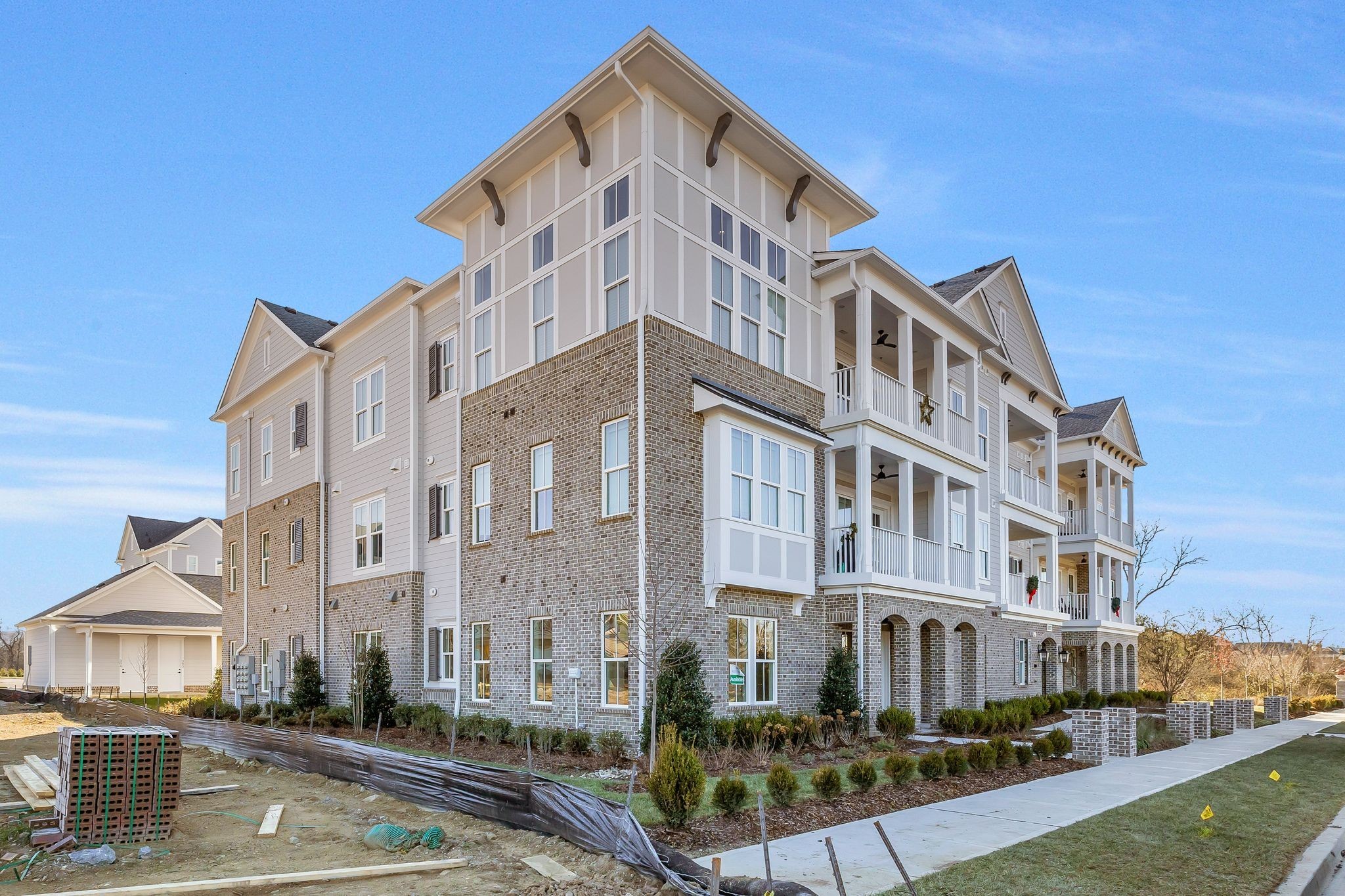 6037 Whitman Road, Unit 202 Franklin, TN 37064 - Photo 4 of 51 a front view of a building with street view