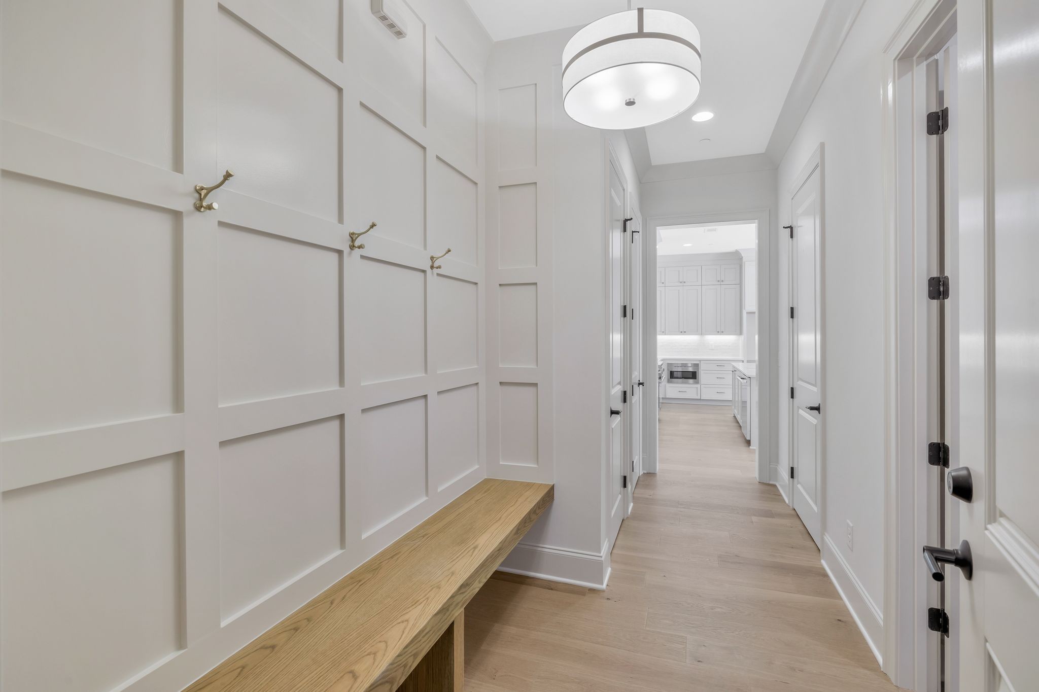 6037 Whitman Road, Unit 202 Franklin, TN 37064 - Photo 8 of 51 a view of a hallway with wooden floor