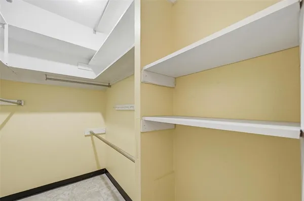 a view of a room with racks on the wall