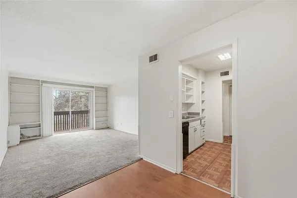 a view of livingroom with furniture and window