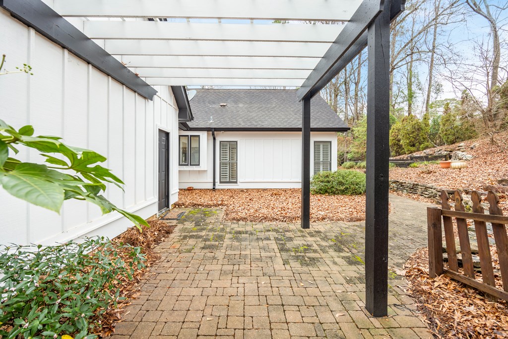 717 Double Churches Road Columbus, GA 31904 - Photo 14 of 54 a view of a porch with a potted plant