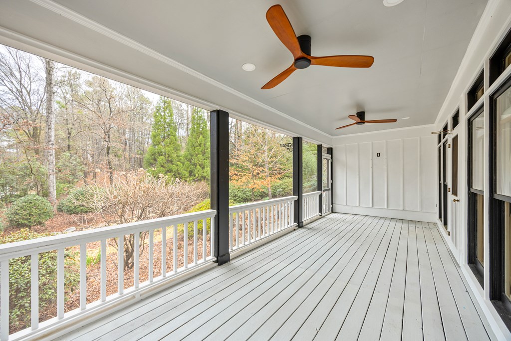717 Double Churches Road Columbus, GA 31904 - Photo 19 of 54 a view of an empty room with wooden floor and a window