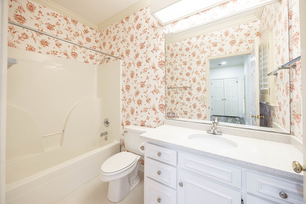 717 Double Churches Road Columbus, GA 31904 - Photo 51 of 54 a bathroom with a sink a toilet and shower