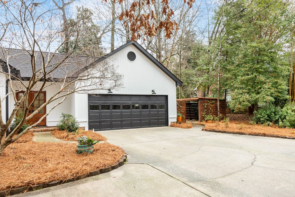 717 Double Churches Road Columbus, GA 31904 - Photo 7 of 54 a view of a house with snow and a tree