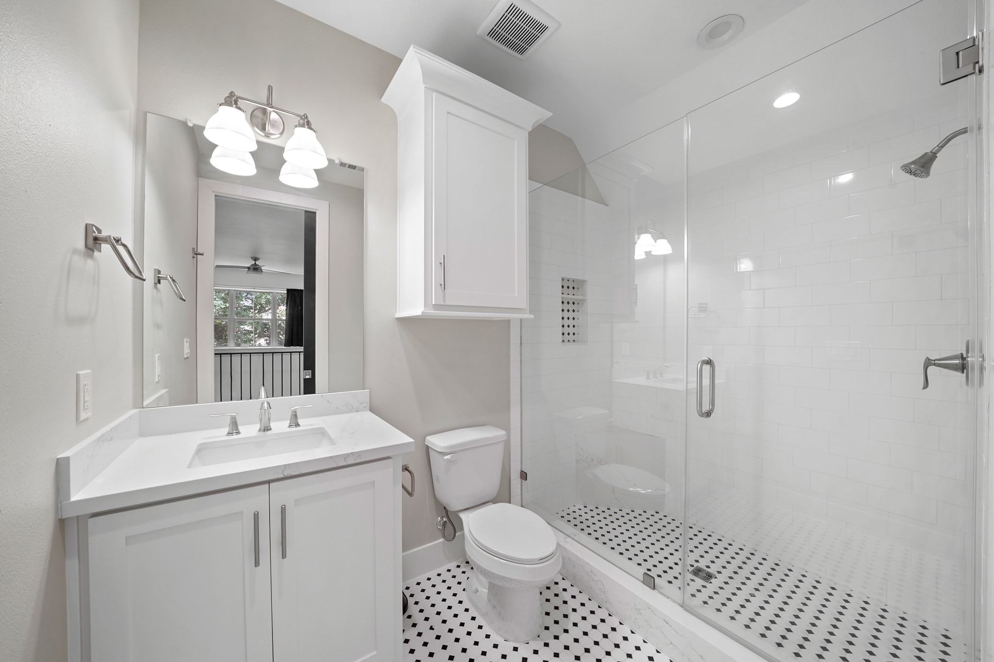 5343 Larkin Street Houston, TX 77007 - Photo 14 of 21 a bathroom with a sink a toilet and shower