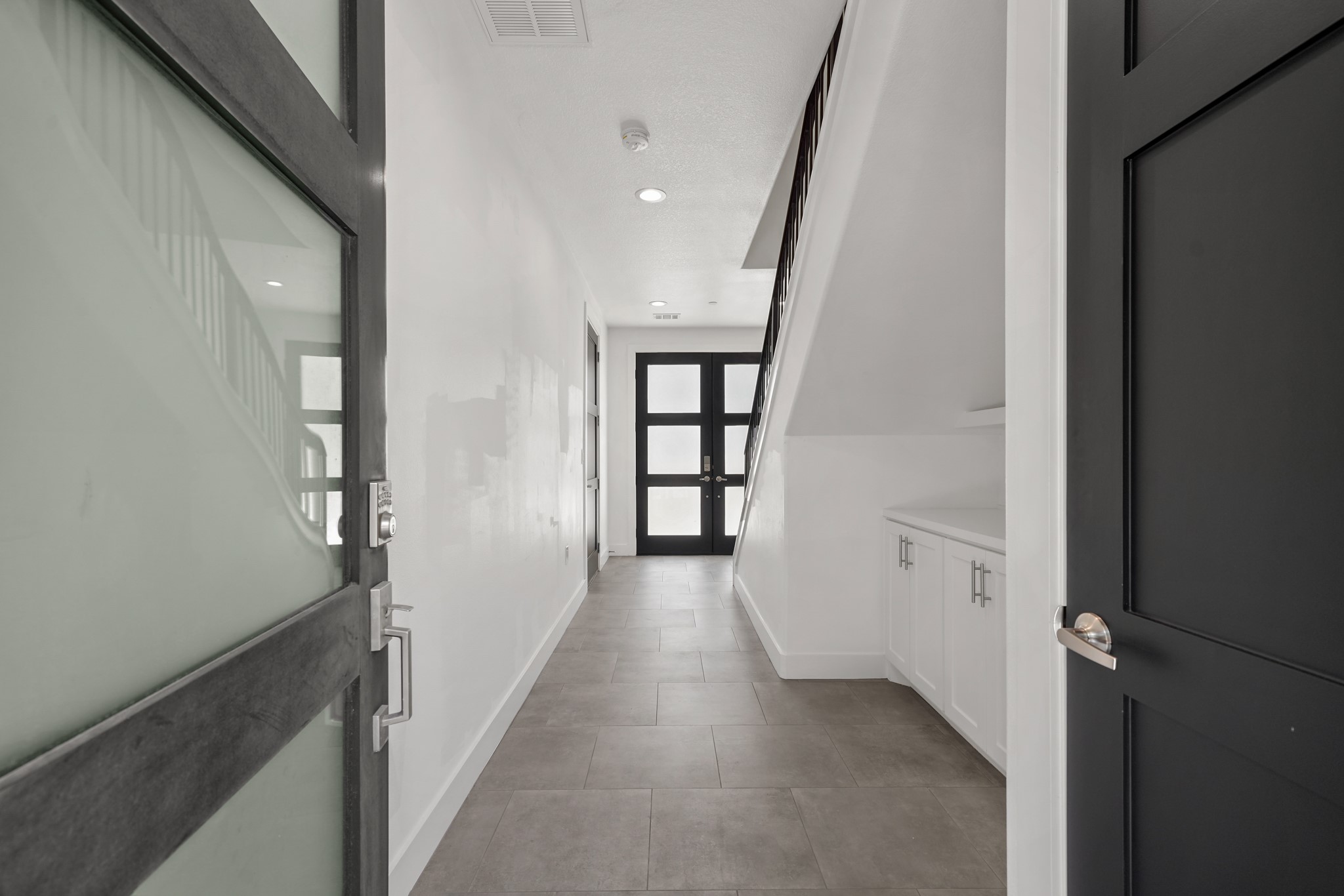 5343 Larkin Street Houston, TX 77007 - Photo 3 of 21 a view of a hallway with wooden floor and entryway