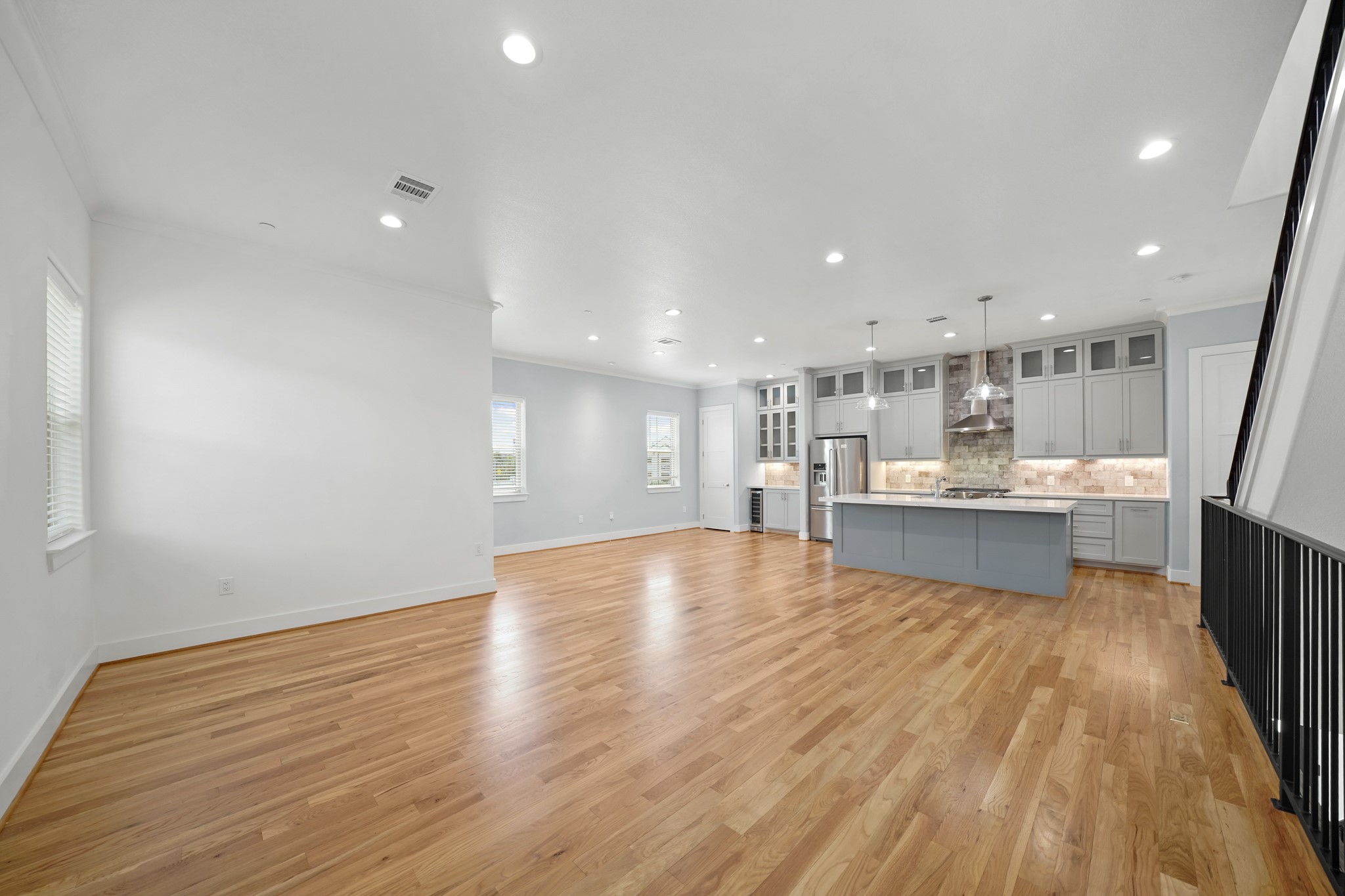 5343 Larkin Street Houston, TX 77007 - Photo 20 of 21 a view of kitchen with wooden floor and windows