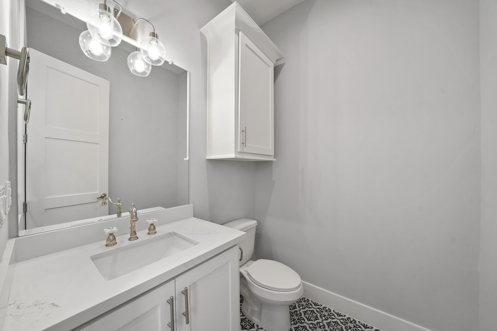 5343 Larkin Street Houston, TX 77007 - Photo 6 of 21 a bathroom with a sink vanity and toilet