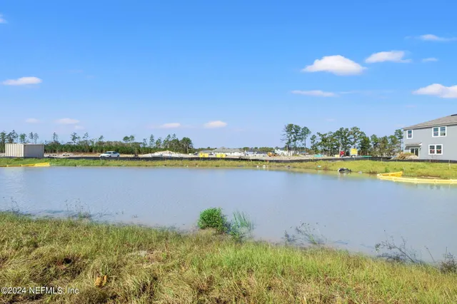 a view of a lake with a city