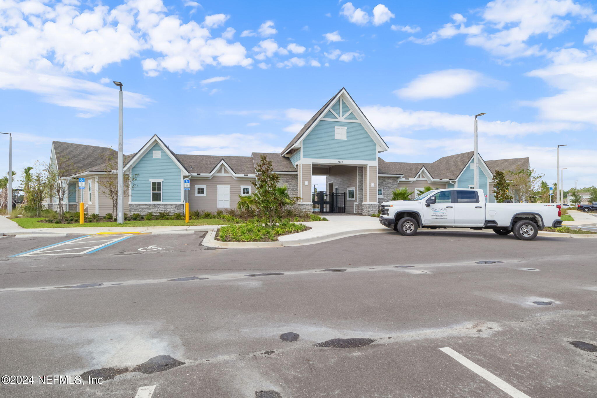 12567 Rubber Fig Terrace Jacksonville, FL 32218 - Photo 20 of 21 a view of a car parked in front of the house with a yard
