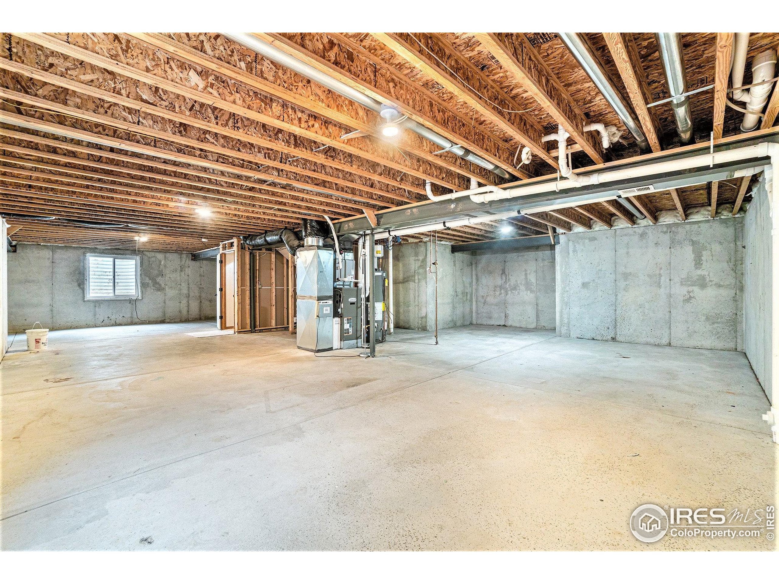 3474 Iron Horse Way Wellington, CO 80549 - Photo 18 of 20 a view of an indoor garage
