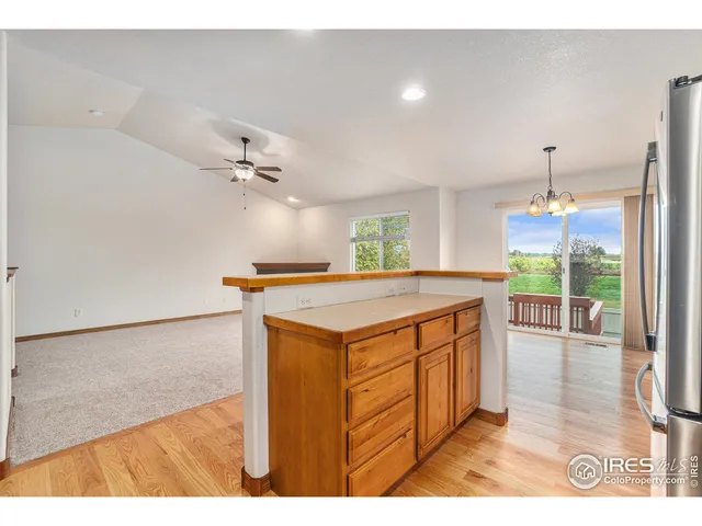 a kitchen that has a lot of cabinets in it