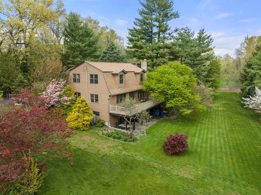 575 Piper Road West Springfield, MA 01089 - Photo 1 of 40 a view of a house with a yard