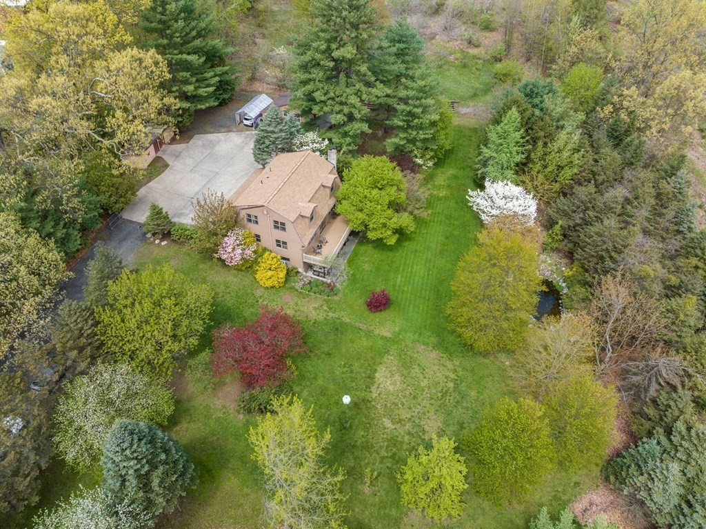575 Piper Road West Springfield, MA 01089 - Photo 35 of 40 a backyard of a house with lots of green space