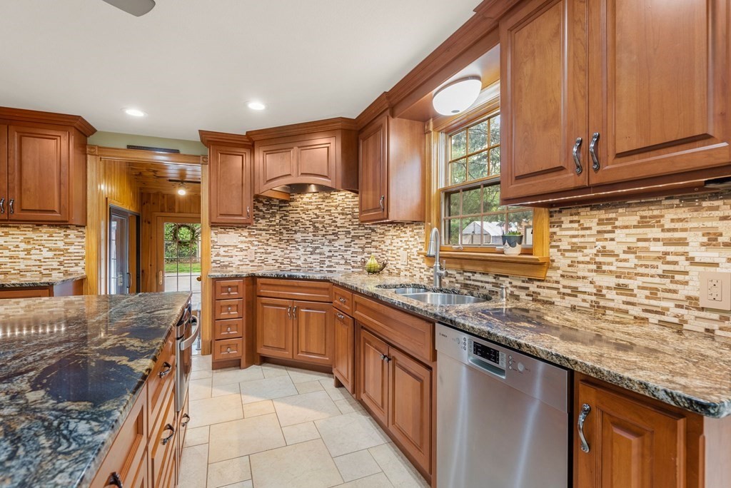 575 Piper Road West Springfield, MA 01089 - Photo 5 of 40 a kitchen with stainless steel appliances granite countertop a sink stove and cabinets