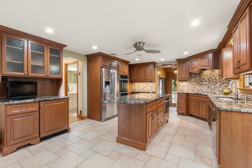 575 Piper Road West Springfield, MA 01089 - Photo 7 of 40 a kitchen with stainless steel appliances granite countertop a stove and a sink