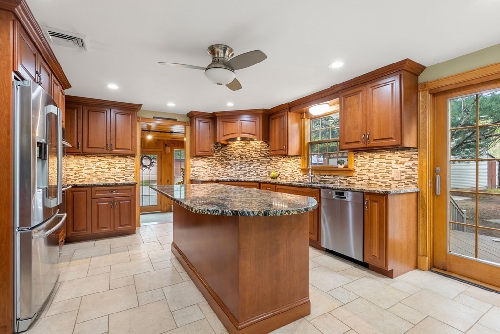 575 Piper Road West Springfield, MA 01089 - Photo 8 of 40 a kitchen with stainless steel appliances granite countertop a stove a sink a oven and a refrigerator