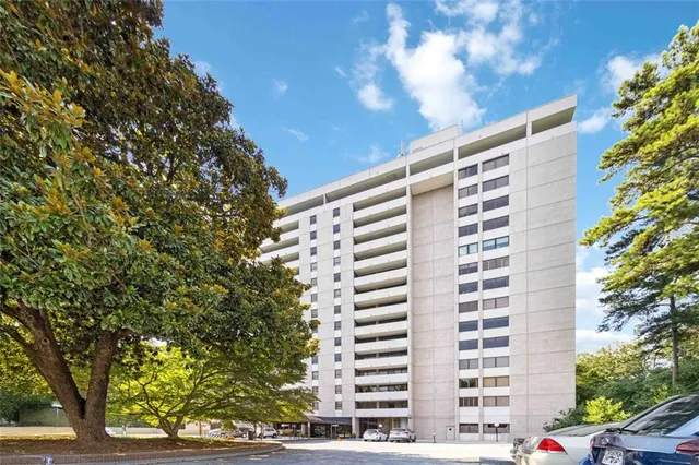 a front view of a building with street view