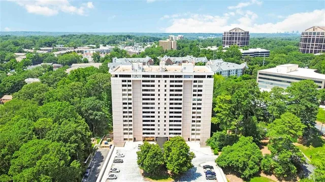 a view of a city with tall buildings
