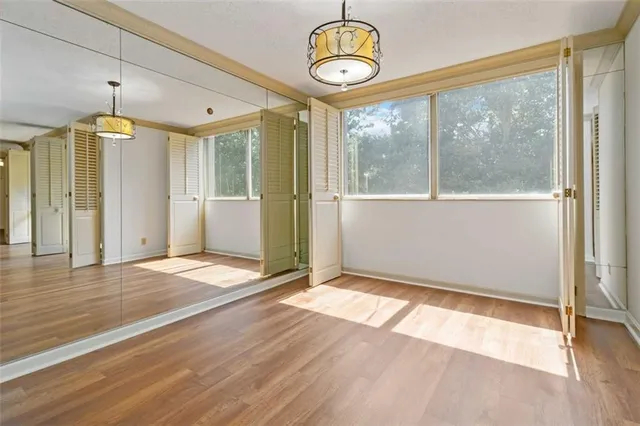 a view of an empty room with a window