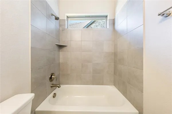 a bathroom with a bathtub
