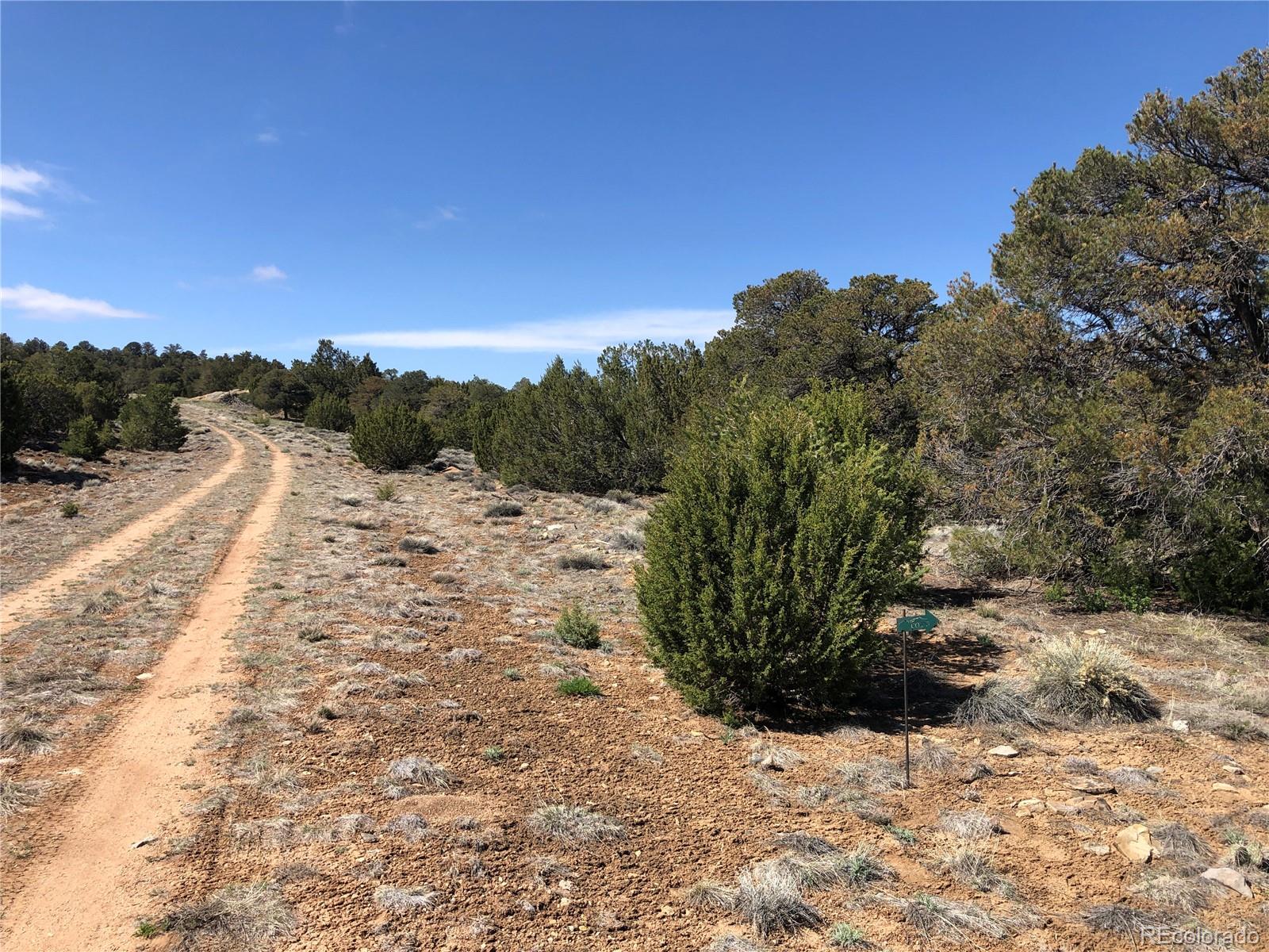 Lot 936 Rio Cucharas Phs, Unit 3 Walsenburg, CO 81089 - Photo 3 of 20 a view of a road with a yard