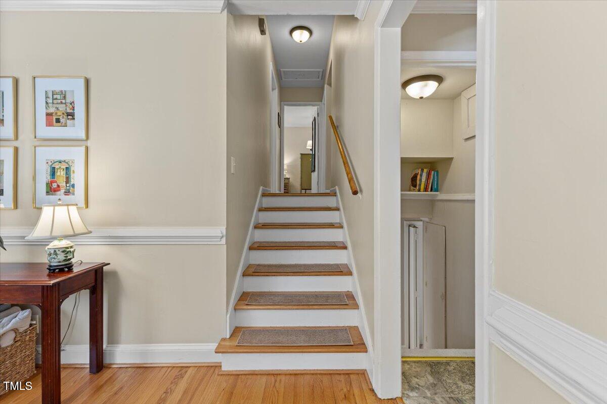 3425 Brentwood Road Raleigh, NC 27604 - Photo 17 of 51 a view of a hallway with wooden floor and entryway