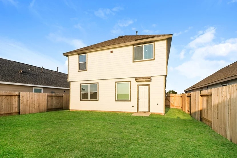 3009 Tallgrass Court Brookshire, TX 77423 - Photo 3 of 17 a front view of a house with a yard