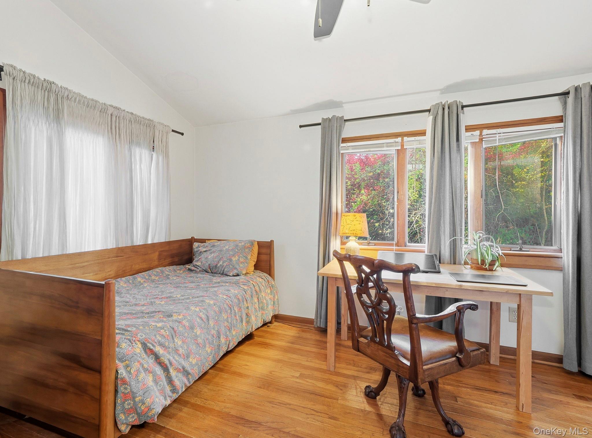 6 Fishkill Road Cold Spring, NY 10516 - Photo 20 of 26 a bedroom with a bed and a table