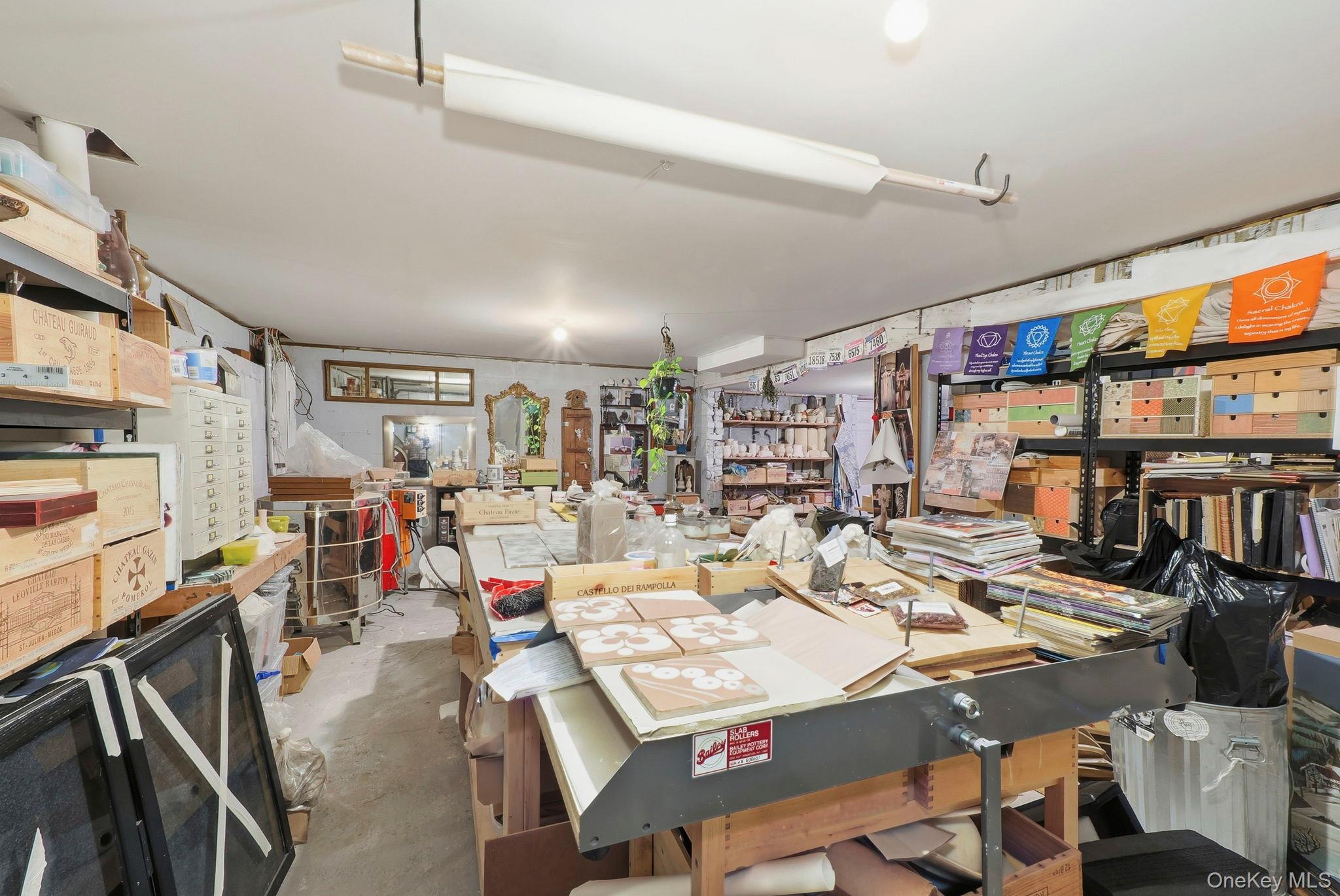 6 Fishkill Road Cold Spring, NY 10516 - Photo 22 of 26 a living room with lots of furniture and clutter