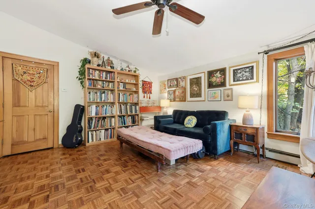 a bedroom with furniture and a window