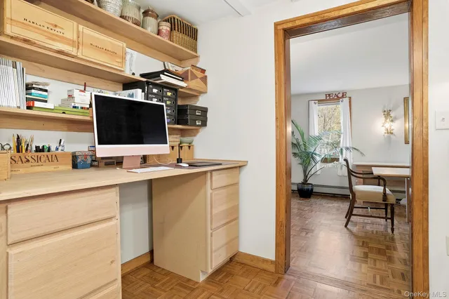 a view of a living room and dining room