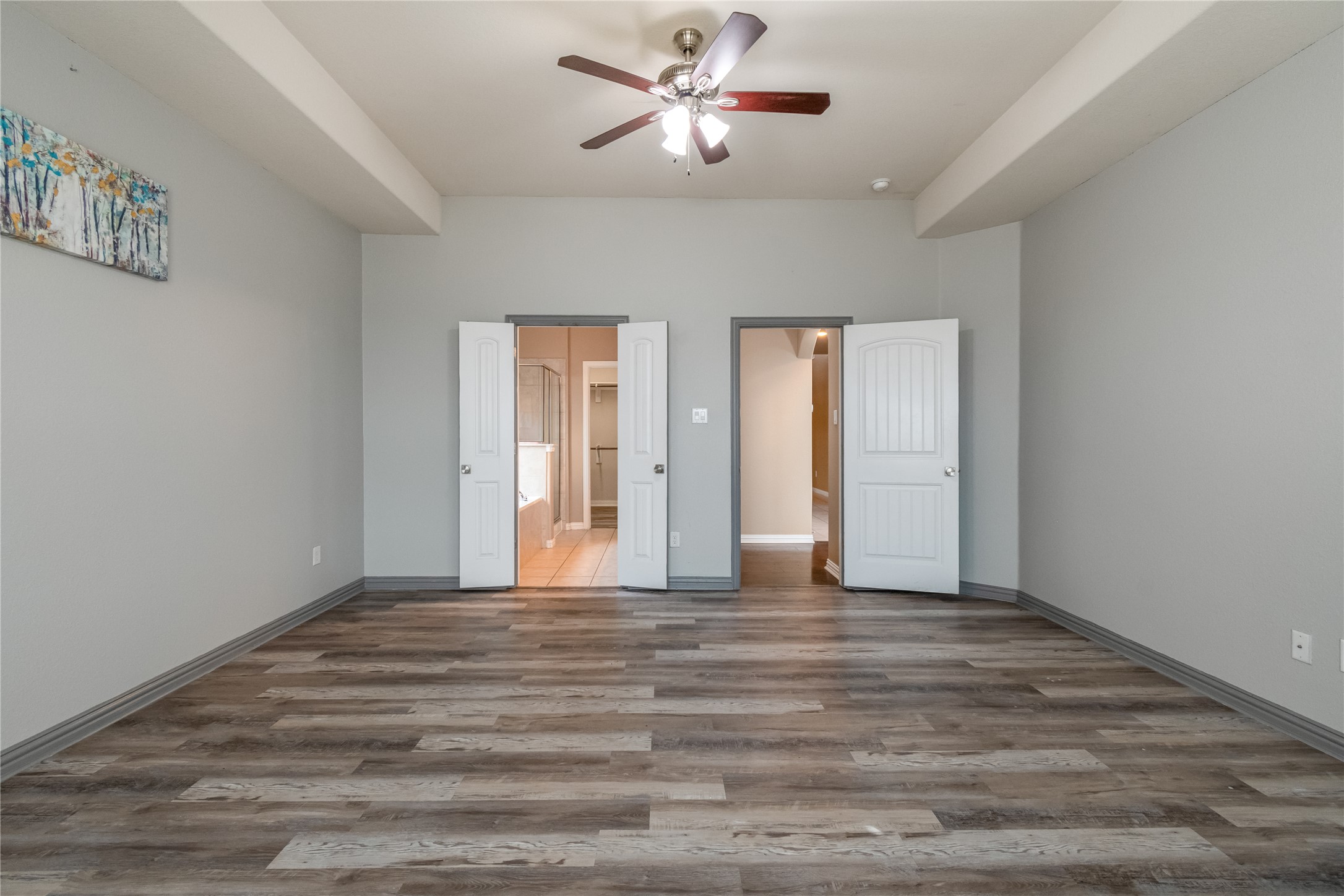 3413 Grail Hollows Road Pflugerville, TX 78660 - Photo 16 of 36 a view of an empty room with window and a kitchen