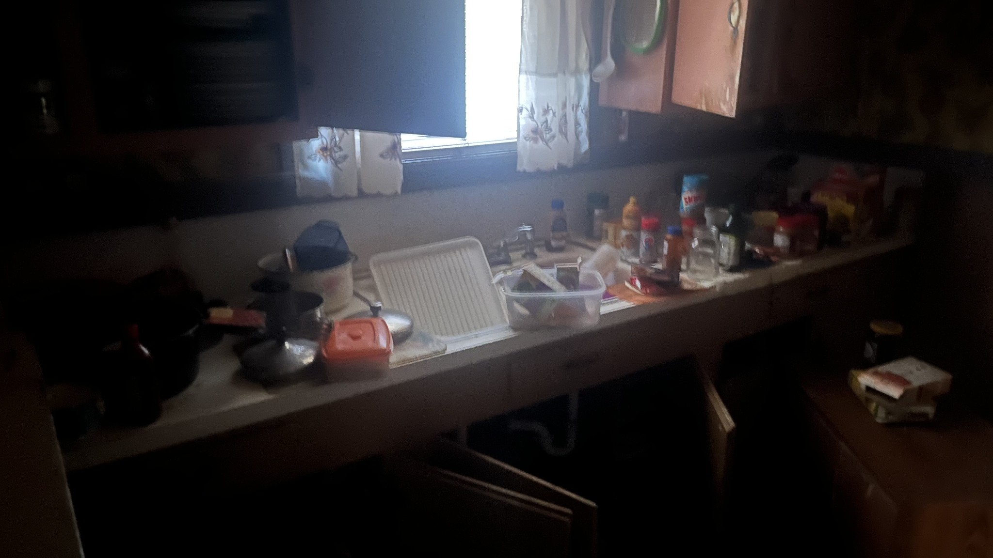 714 Spring Street Memphis, TN 38112 - Photo 20 of 21 a kitchen with a sink dishwasher and cabinets with wooden floor