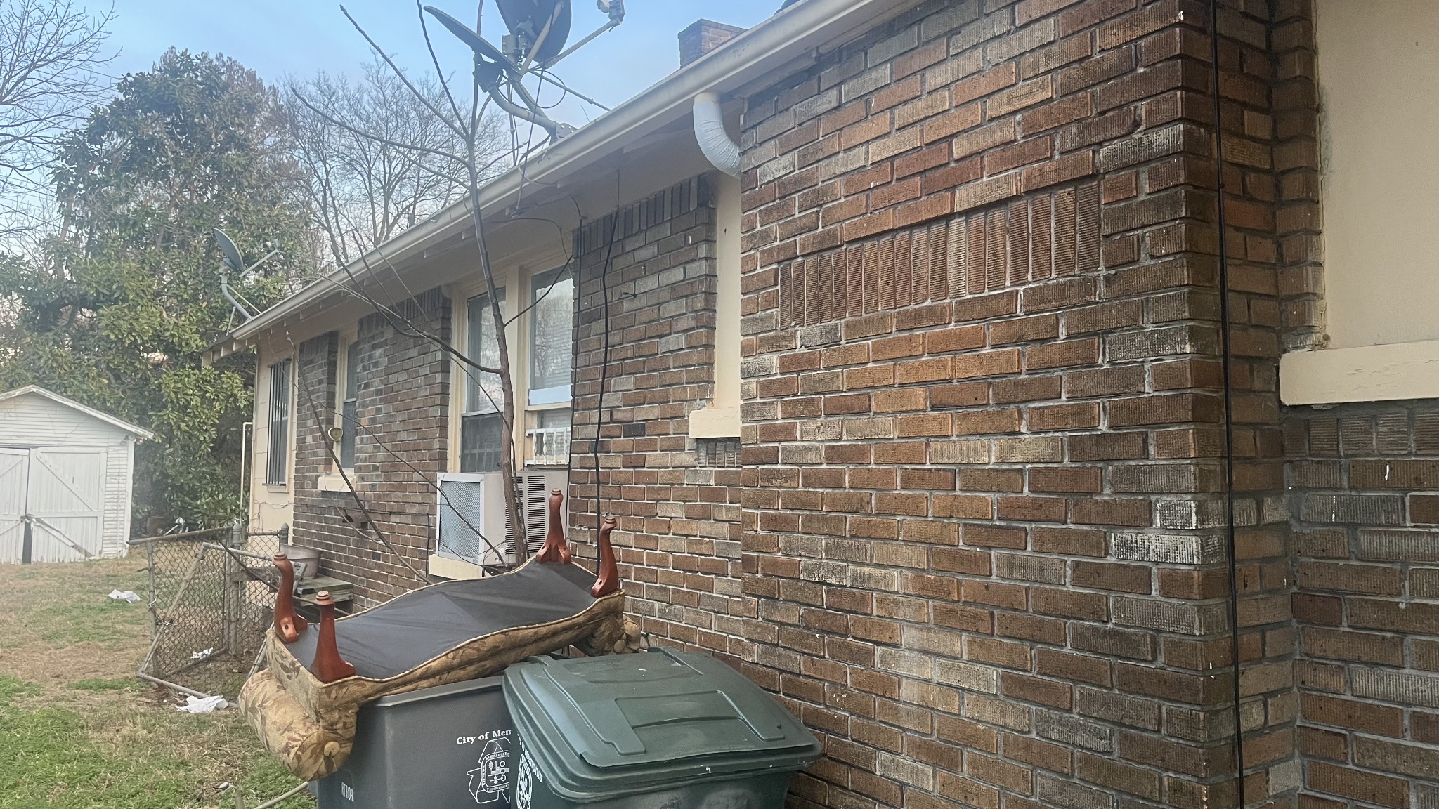 714 Spring Street Memphis, TN 38112 - Photo 2 of 21 a brick house with four windows