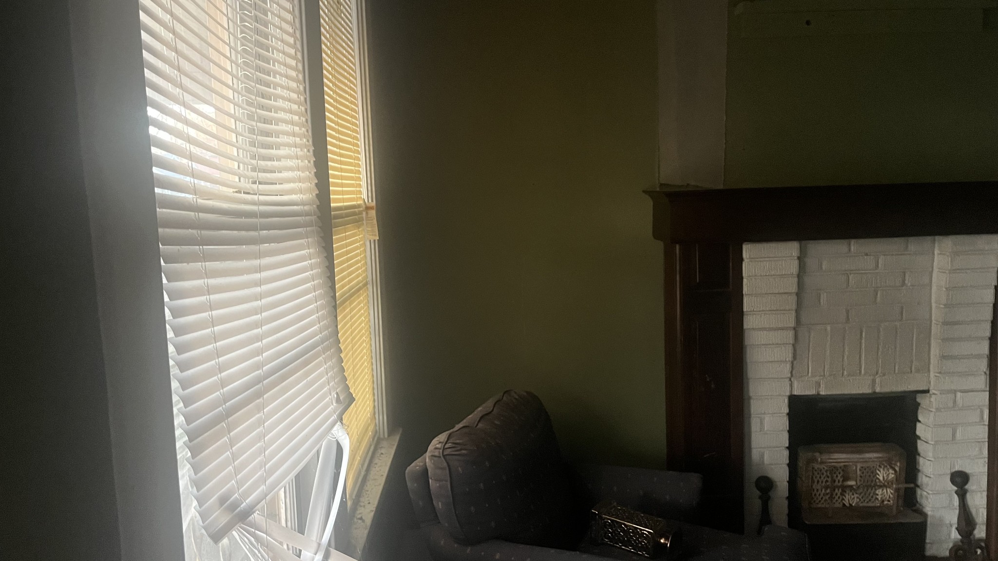 714 Spring Street Memphis, TN 38112 - Photo 9 of 21 a living room with furniture and a fireplace