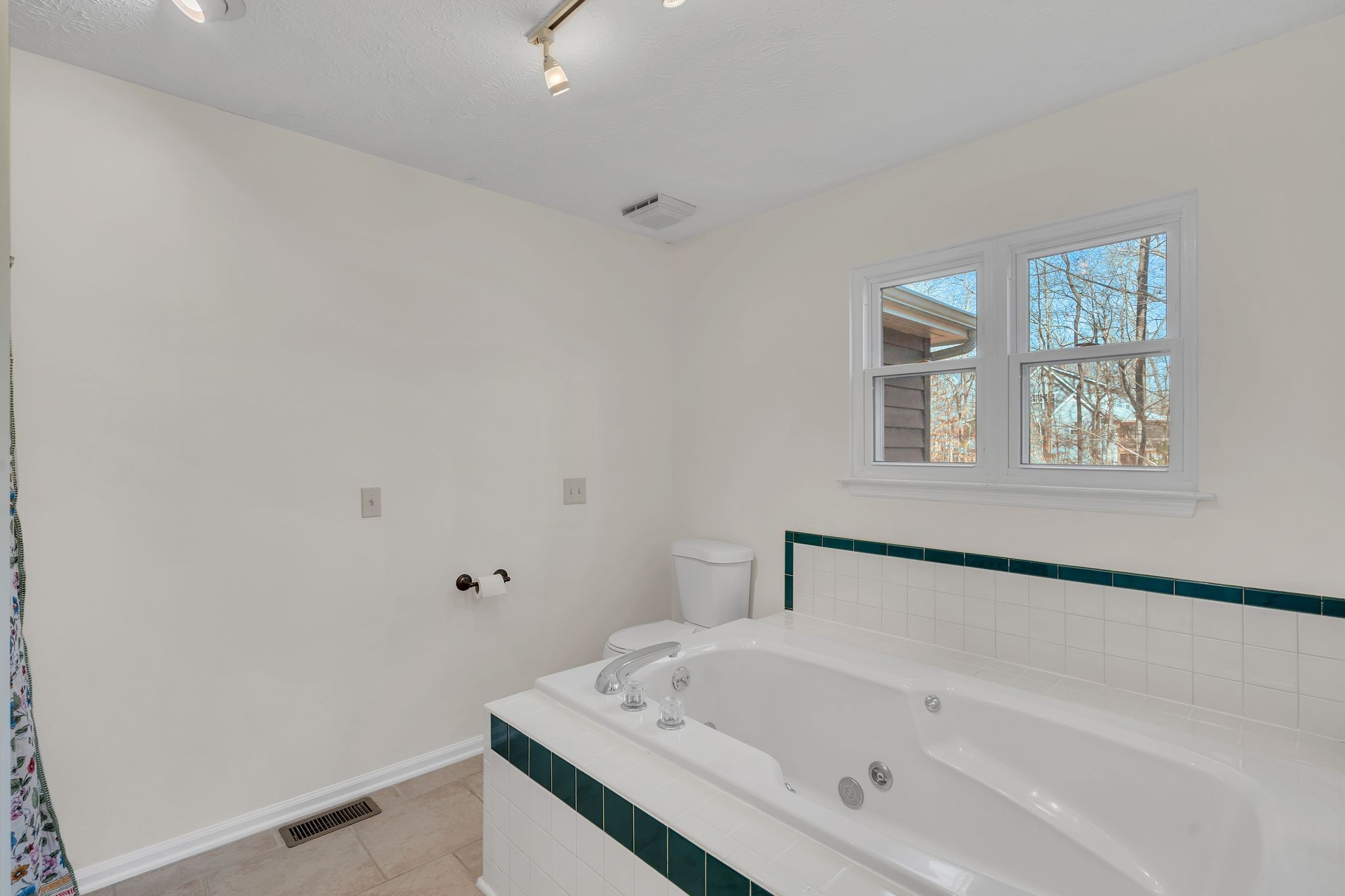 1365 Campbell Ridge Road Kingston Springs, TN 37082 - Photo 18 of 28 a white bath tub sitting next to a white sink