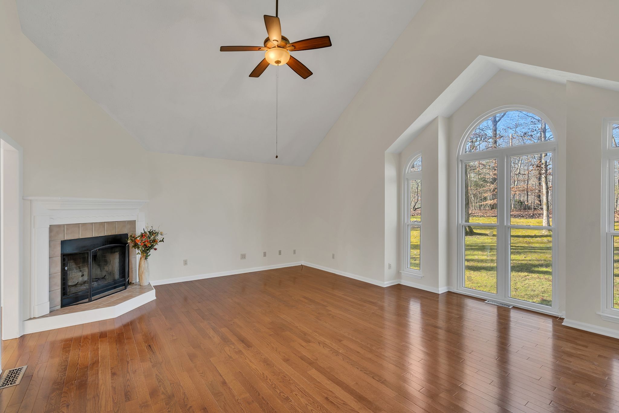 1365 Campbell Ridge Road Kingston Springs, TN 37082 - Photo 7 of 28 wooden floor in an empty room with a window