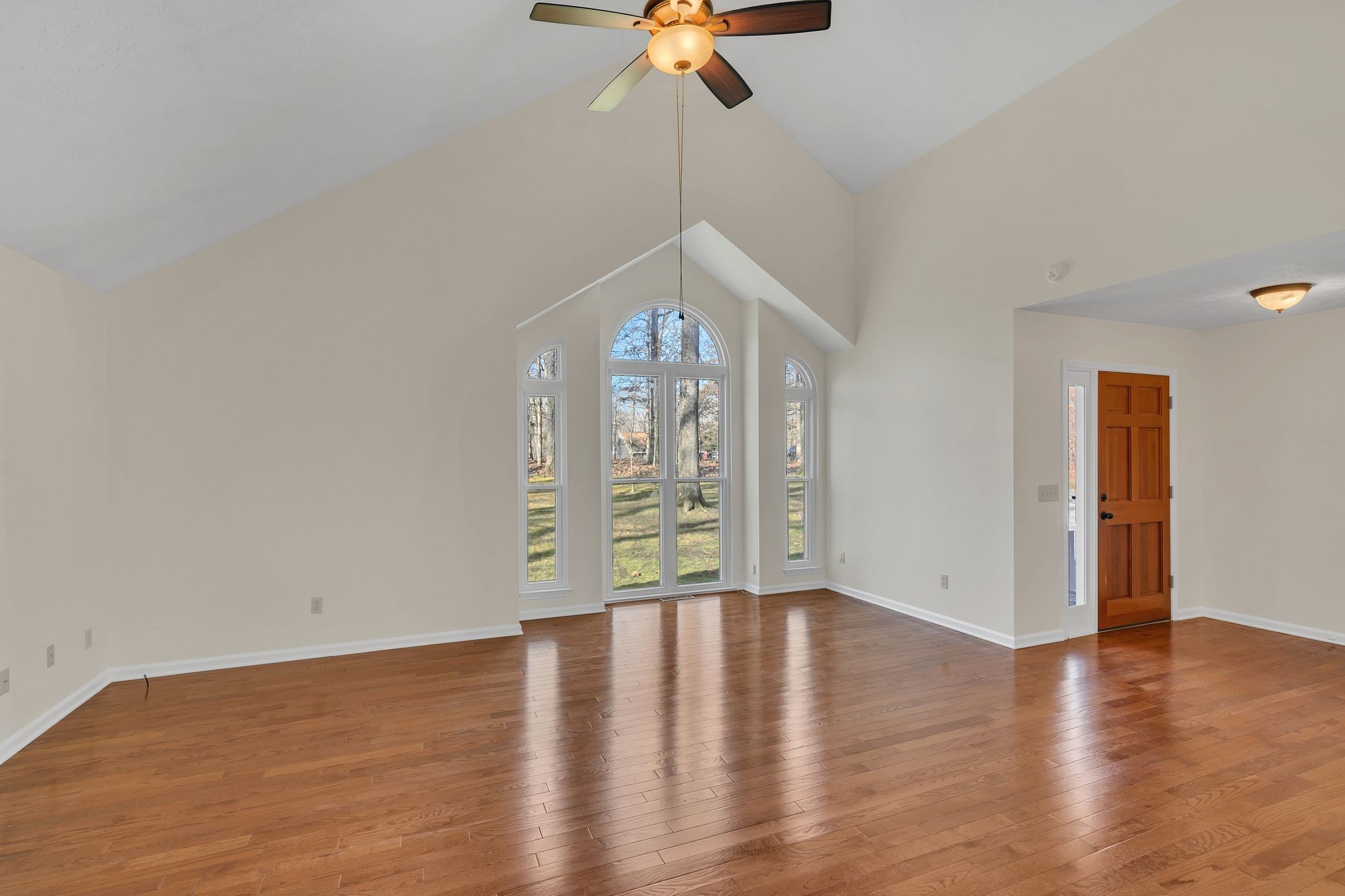 1365 Campbell Ridge Road Kingston Springs, TN 37082 - Photo 8 of 28 a view of an empty room with window and wooden floor
