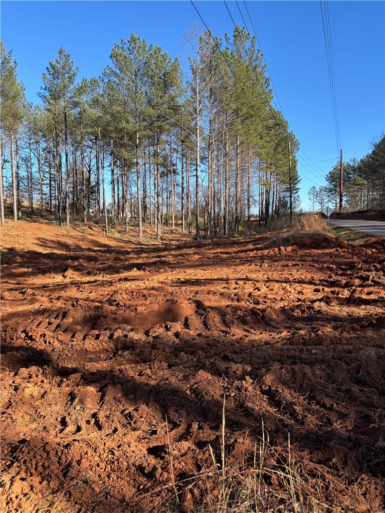 0 Burns Mill Road West Union, SC 29696 - Photo 7 of 10 This expansive, cleared lot offers ample space for building, surrounded by mature trees.