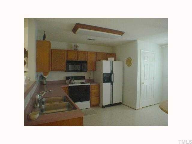 2100 Walnut Court Raleigh, NC 27610 - Photo 4 of 8 Kitchen has plentyof room for a large table.