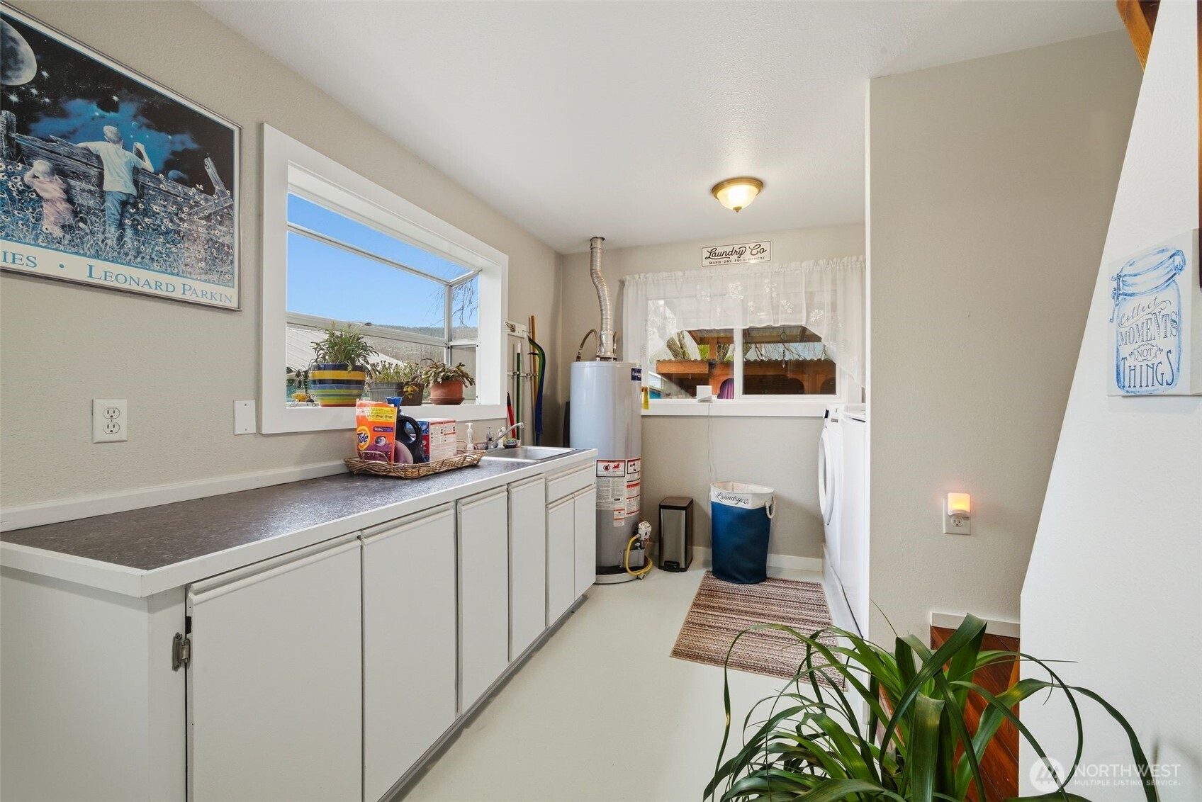 701 Jennings Street Sedro-Woolley, WA 98284 - Photo 15 of 40 a kitchen with stainless steel appliances a sink stove and cabinets