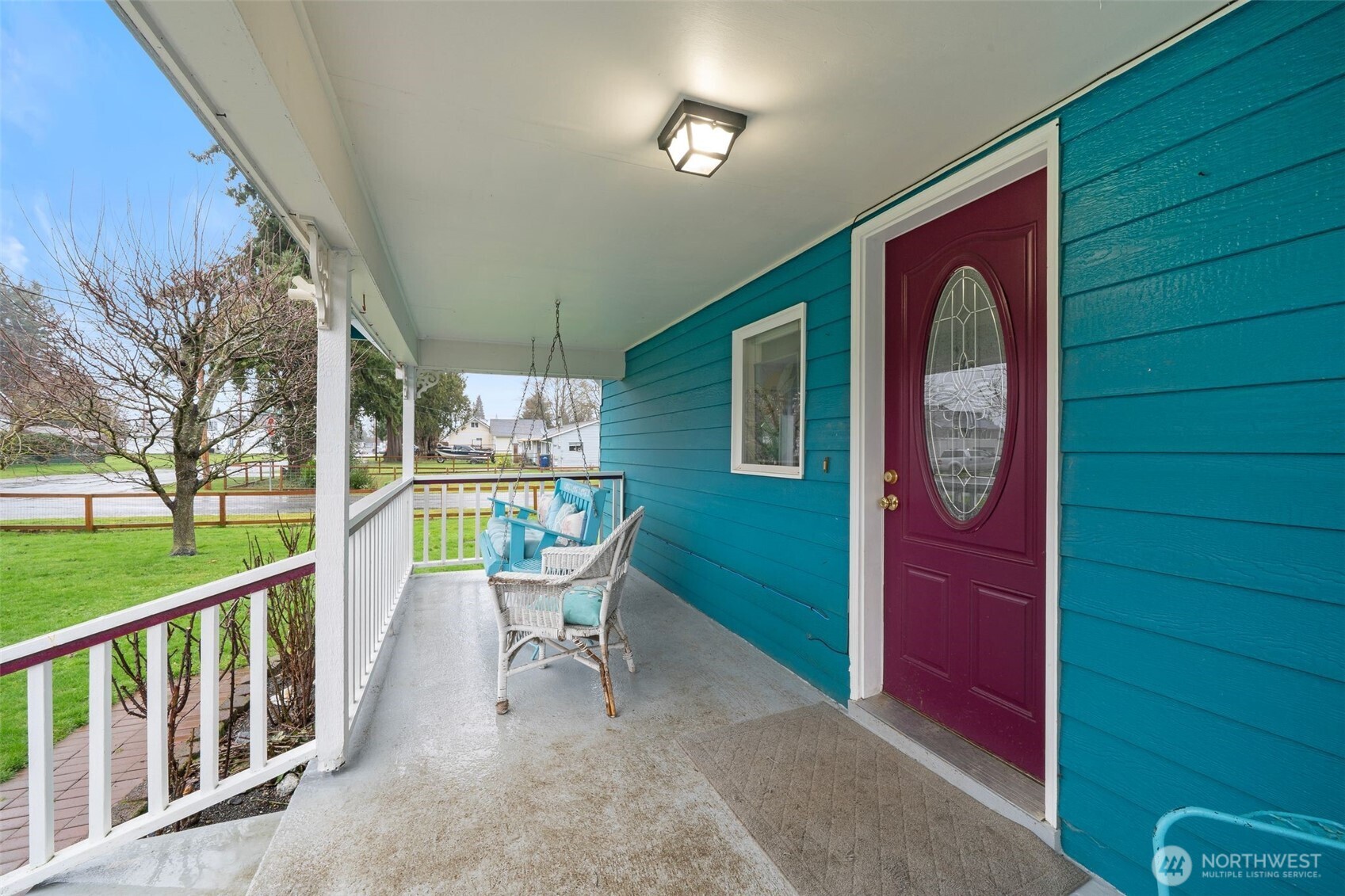701 Jennings Street Sedro-Woolley, WA 98284 - Photo 2 of 40 a view of a chairs and table in a balcony